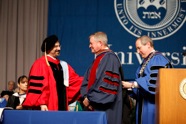 J. Polisi receiving honorary degree