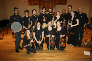 Ann Lucas with a performance group 