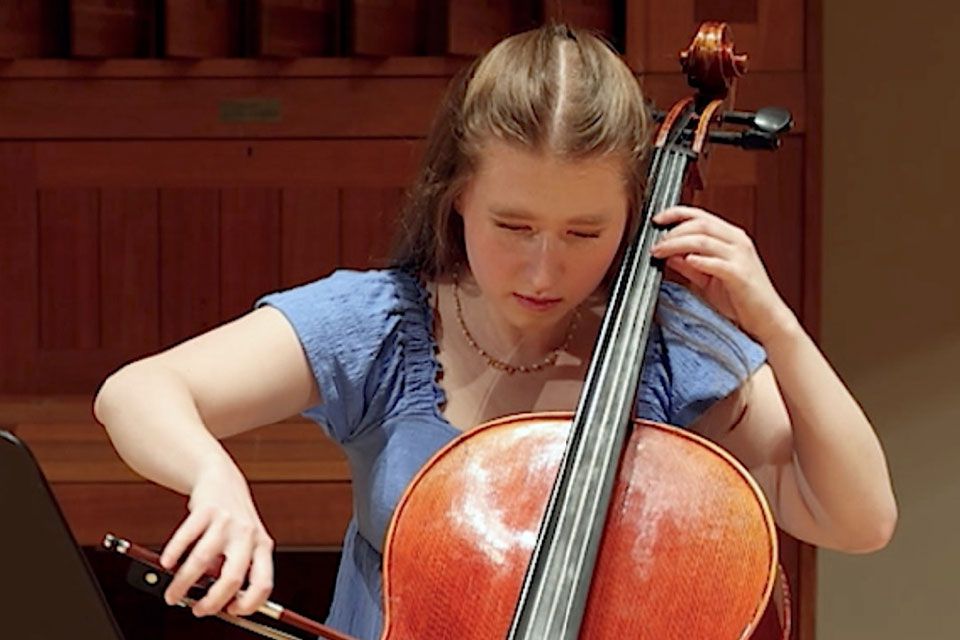 A Brandeis music major plays the cello.