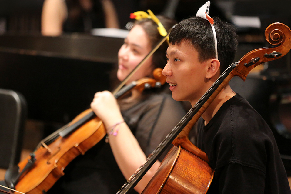 Students playing in an orchestra