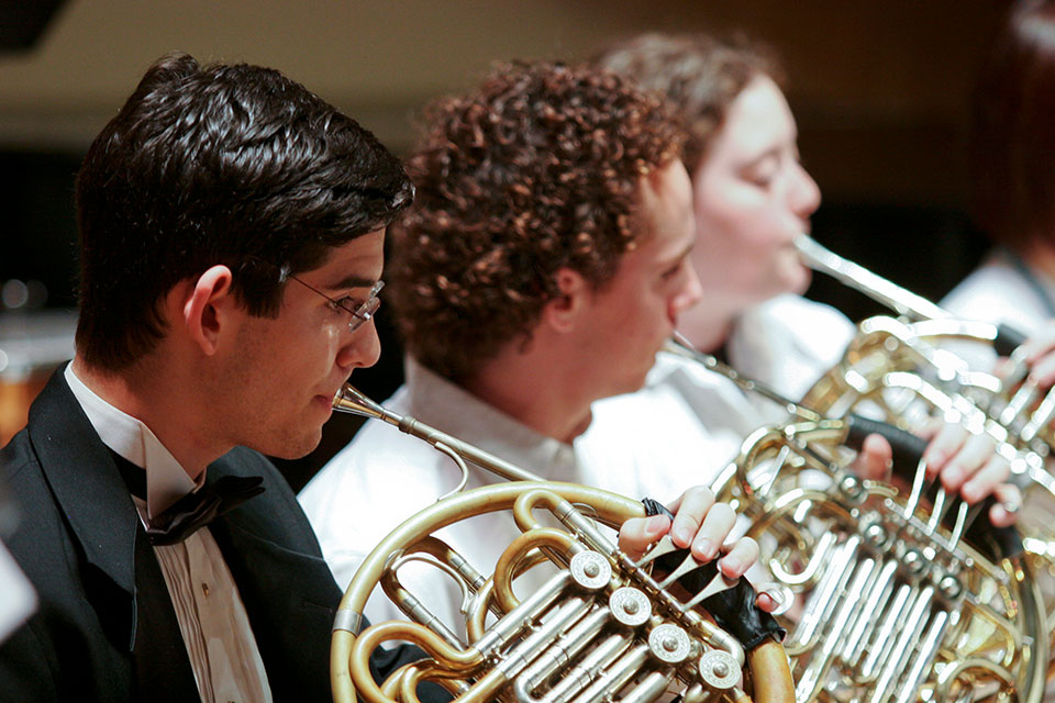 Wind instrument players in performance