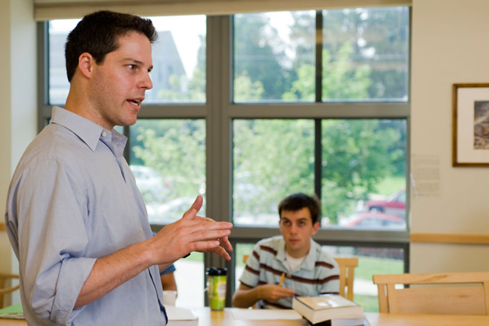 Guy Antebi teaches in a classroom