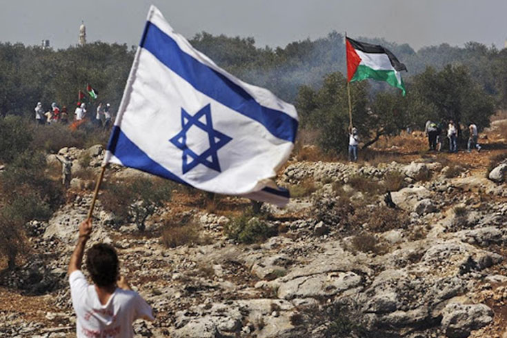 A person holding the Israeli flag and another person holding the Palestinian flag.
