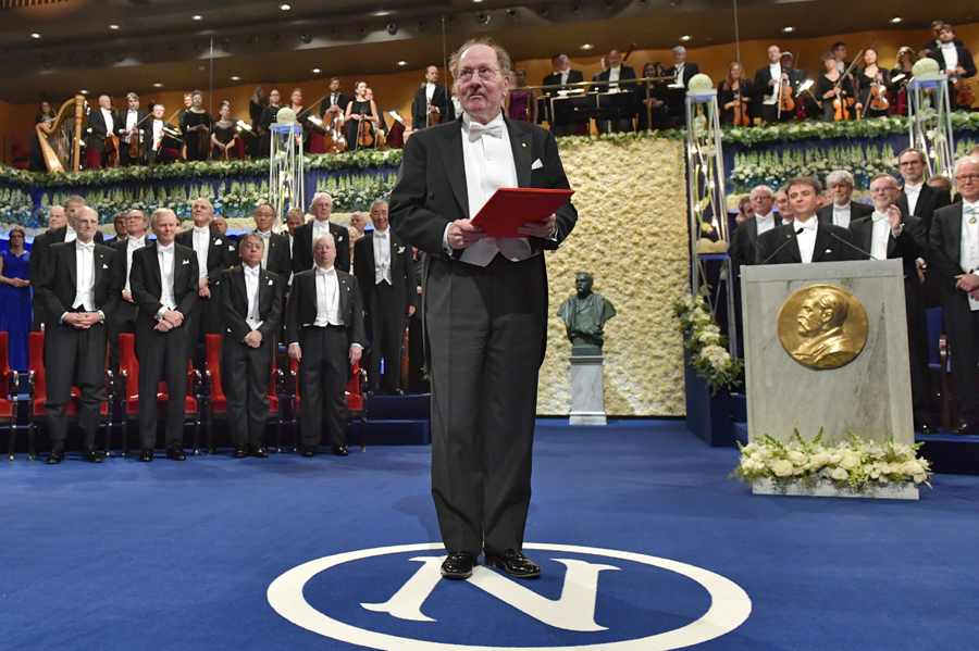 Jeff Hall stands on the stage at Stockholm Concert Hall
