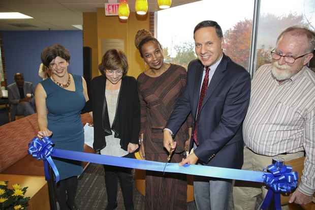 President Liebowitz opens a ceremony with a ribbon cutting