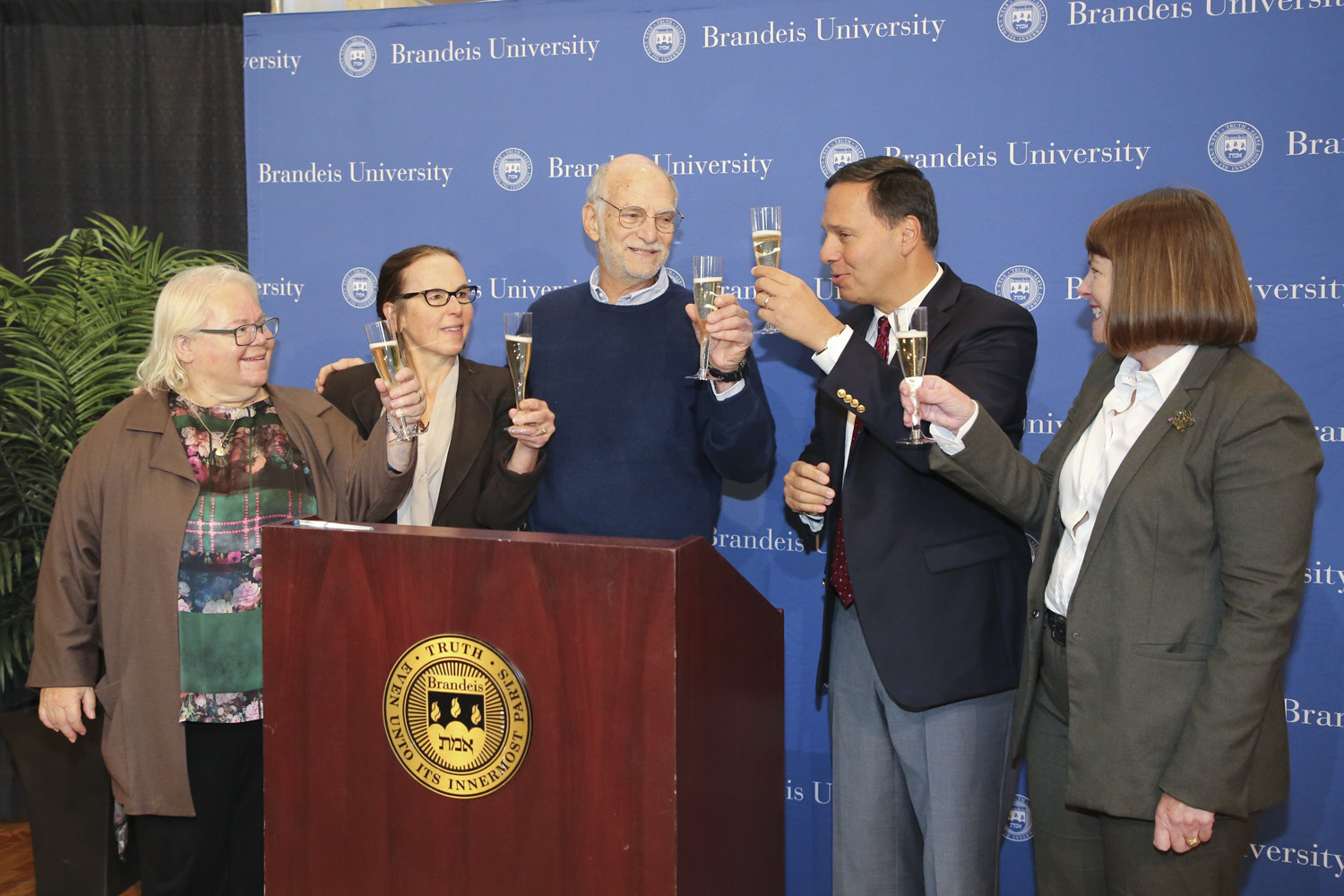 President Liebowitz give Rosbash a champagne toast 
