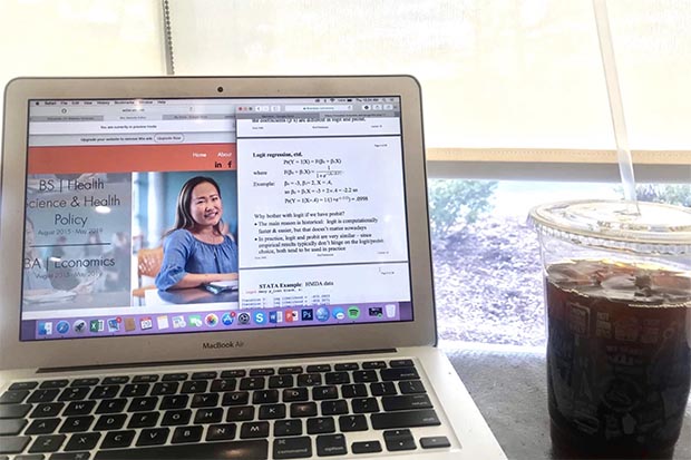 A computer screen with a to-do list and a photo of a Brandeis student