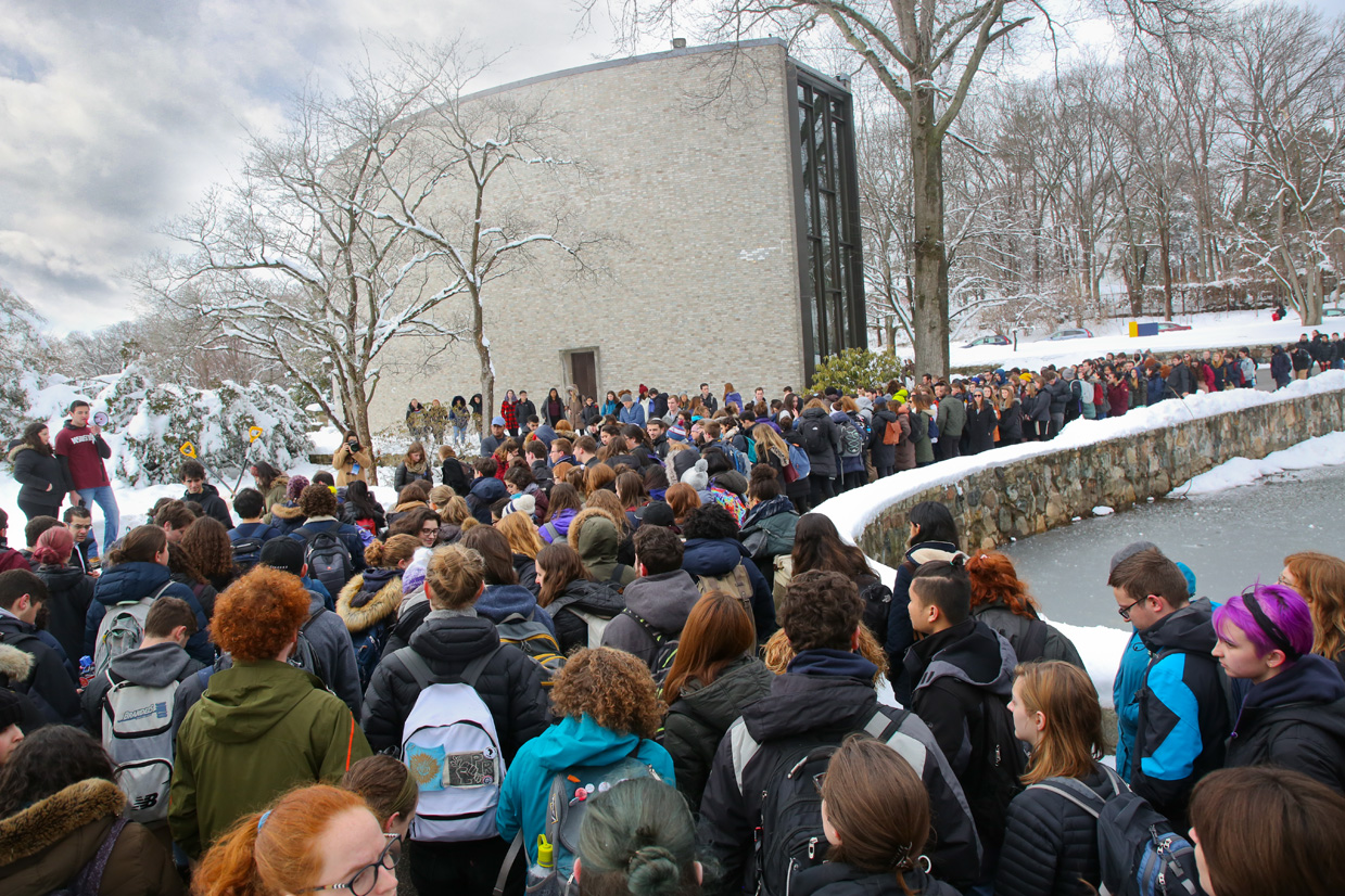 Students gather around Chapels Pond for memorial