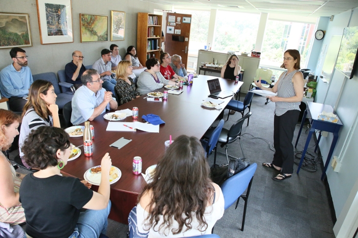 Attendees watch Wendy Cadge speak at Summer Lab event