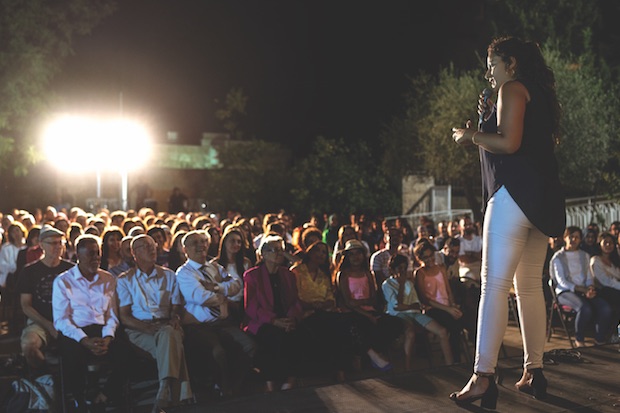 Noam Shuster-Eliassi ’11 performing in front of an audience.