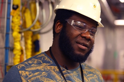 graduate student Luke Korley works at the Sanford Underground Resarch Facility, searching for dark matter