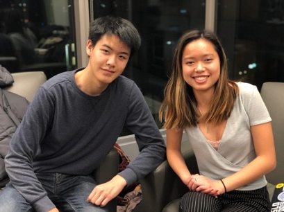 Kurtis Lee ’22 and Vanasupa ‘22, members of Brandeis' debate team, seated in chairs