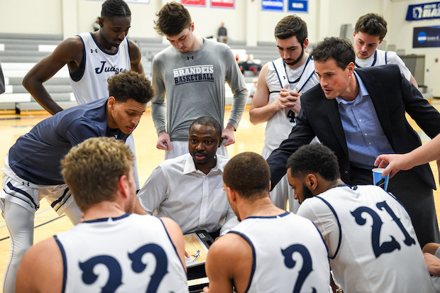 Jean Bain draws up a play during a team huddle.