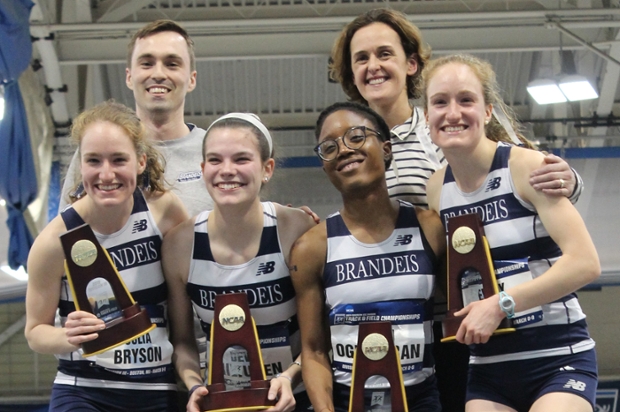 Julia Bryson, Devin Hiltunen '22, Doyin Ogundiran '19 and Emily Bryson '19 stand atop the podium with coaches Delahunty Evans and Steve Flanagan