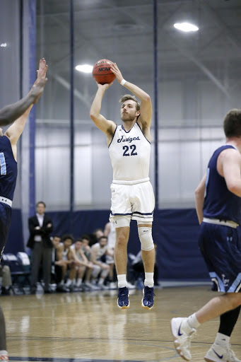 Eric D’Aguanno taking a jump shot.