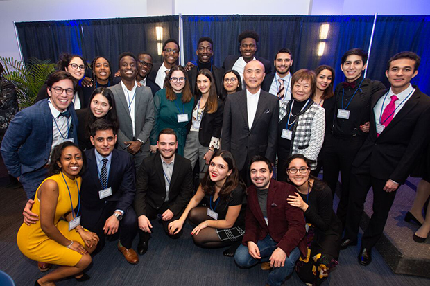 Tom Watanabe poses with Wien Scholars