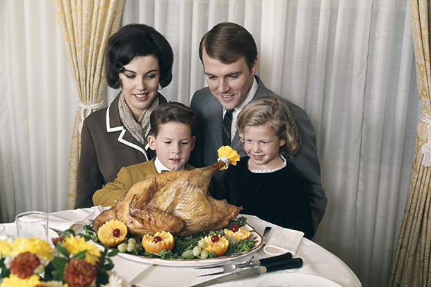 Family eating Thanksgiving dinner