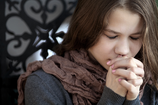 a woman in prayer