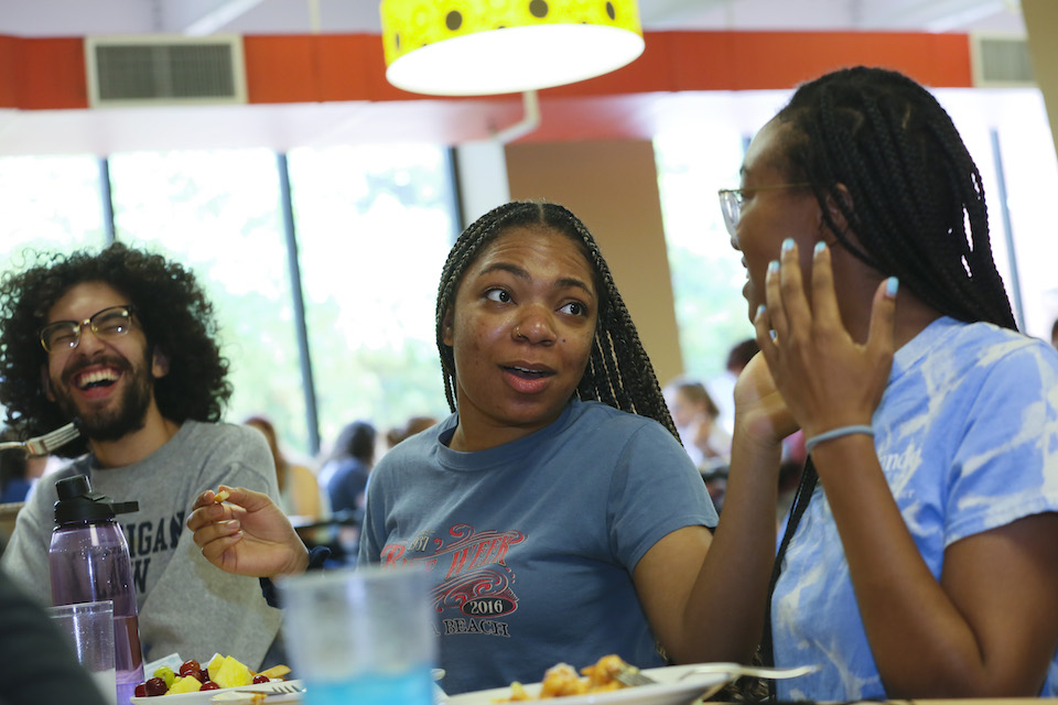 Students chat while having lunch