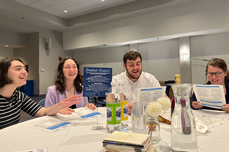 Students at shabbat dinner