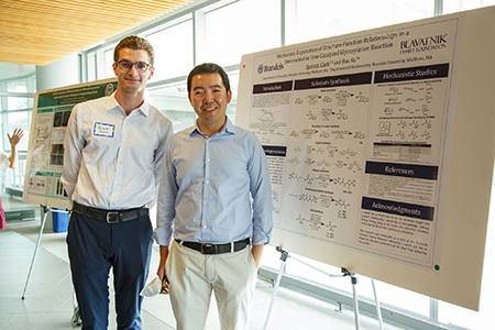 Spencer poses with his poster and mentor.