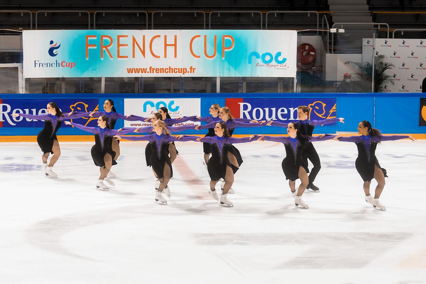 Synchronized Figure Skating Team skates on the ice at the French Cup