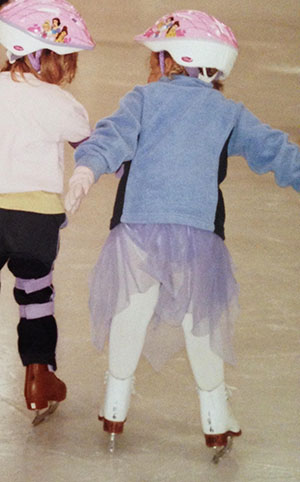 Sami Winawer learning to skate at a young age