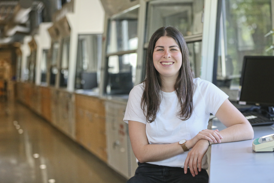 Kyra Fischer sits in the lab