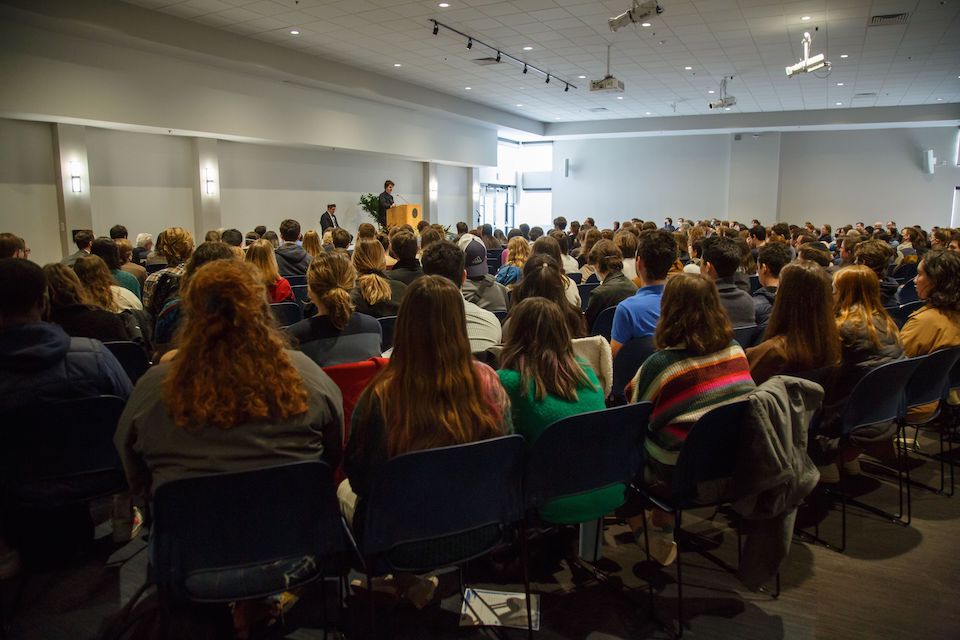 the crowd inside sherman function center during a memorial for Vanessa Mark