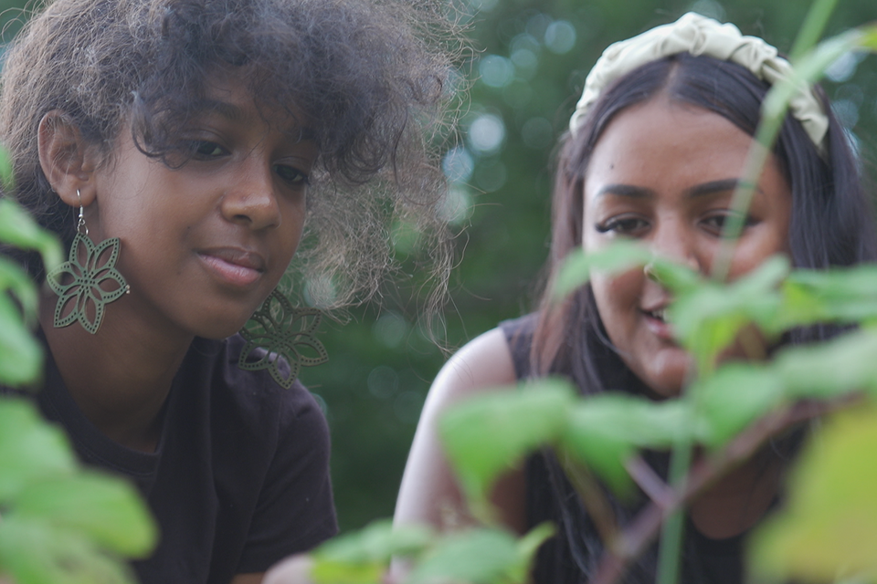 Ava Faria with a student