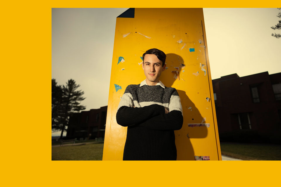 Cameron Samuels stands in front of yellow post