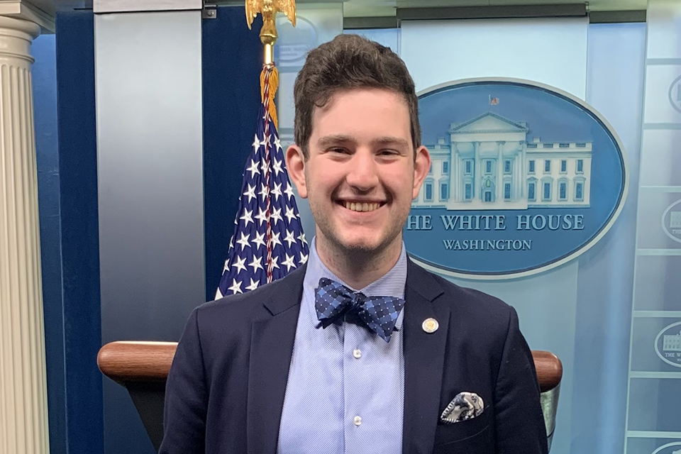 Zac Gondelman stands in the white house