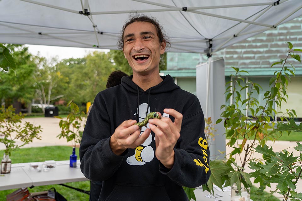 Forrest holds caterpillar