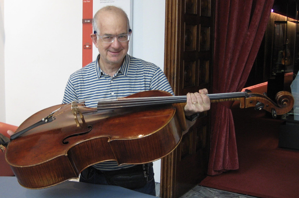 Harry Mairson holds instrument