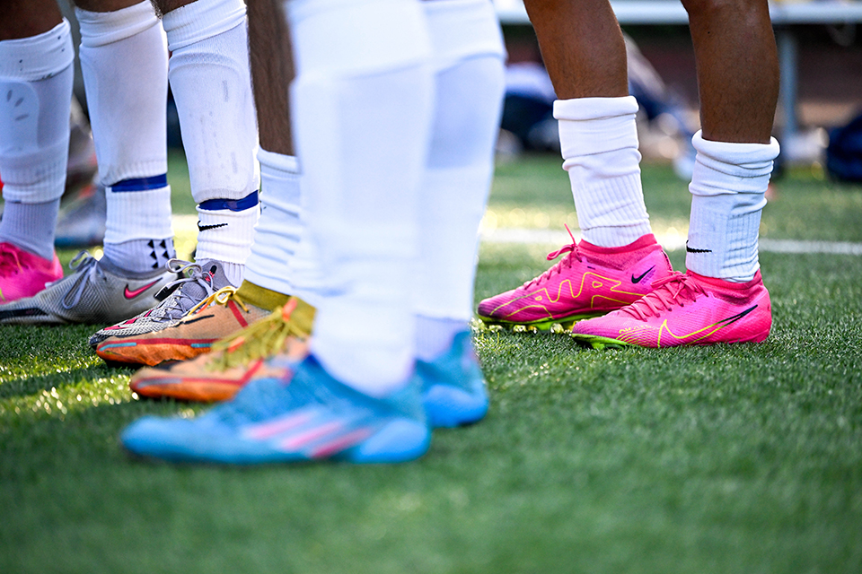 Soccer players wearing shoes