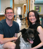 Scientists Bruce Goode and Kyoko Okada with lab dog Sasha