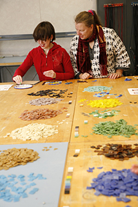 students creating mosaics