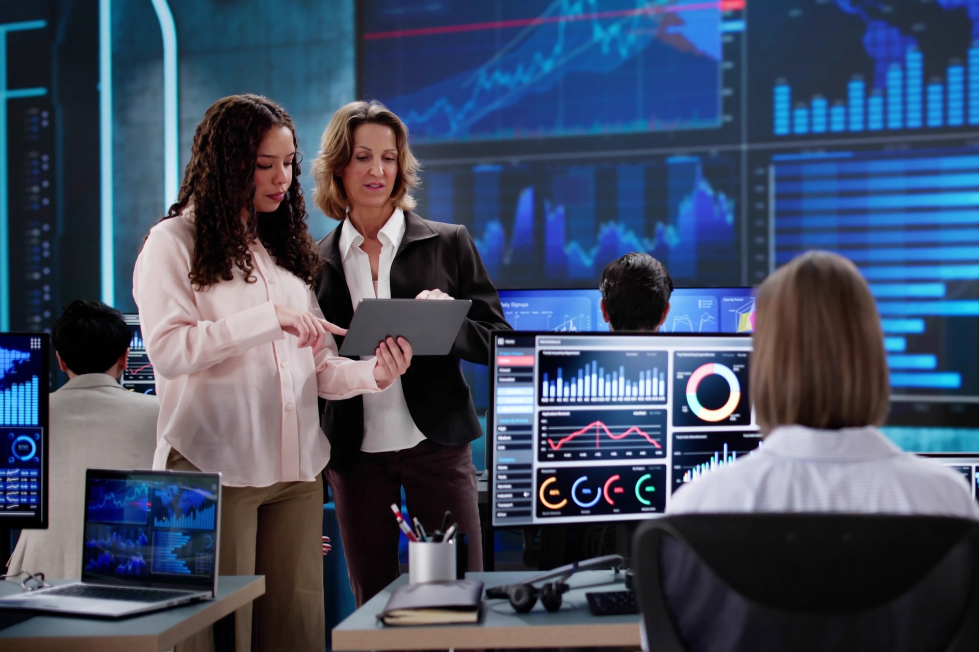 Scientists looking at a smart board