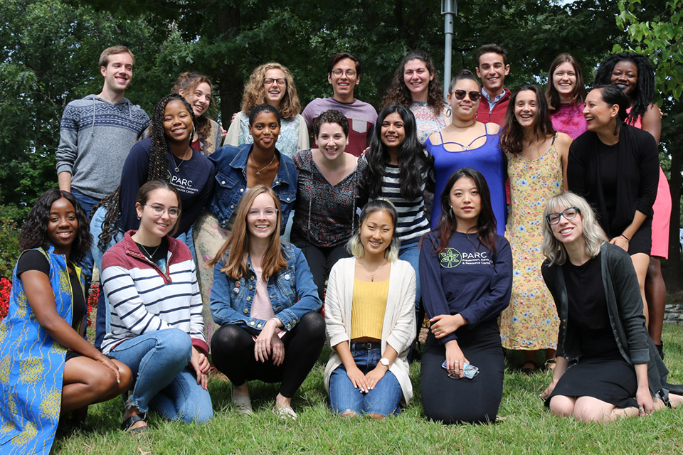 the parc team poses outside on a sunny day