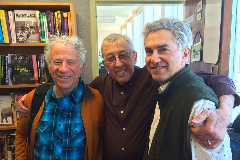 Three Peace faculty members smile for the camera