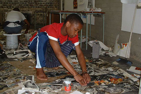 A person cleans up after a fire