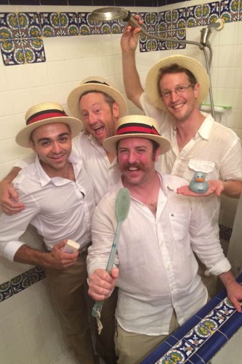 Daniel Tigard's Quartet posing in the bathtub