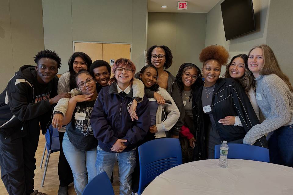 A group of student scholars smiling at the camera.
