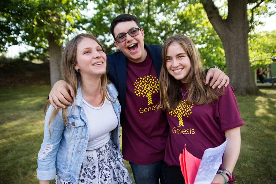 Students laughing together outside during a previous Precollege summer session