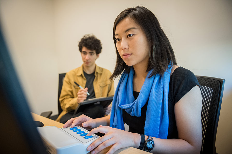 Two students in the CoPE lab