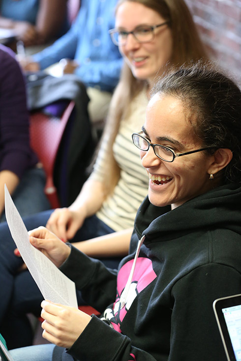 Two smiling students seated in a psychology class