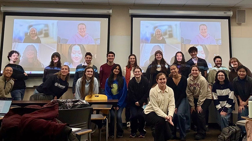 CAARD Lab members pose for a photo in a classroom.