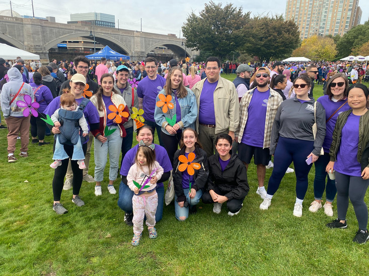 Berry lab members and their families posing for a photo at the Walk to End Alzheimer's