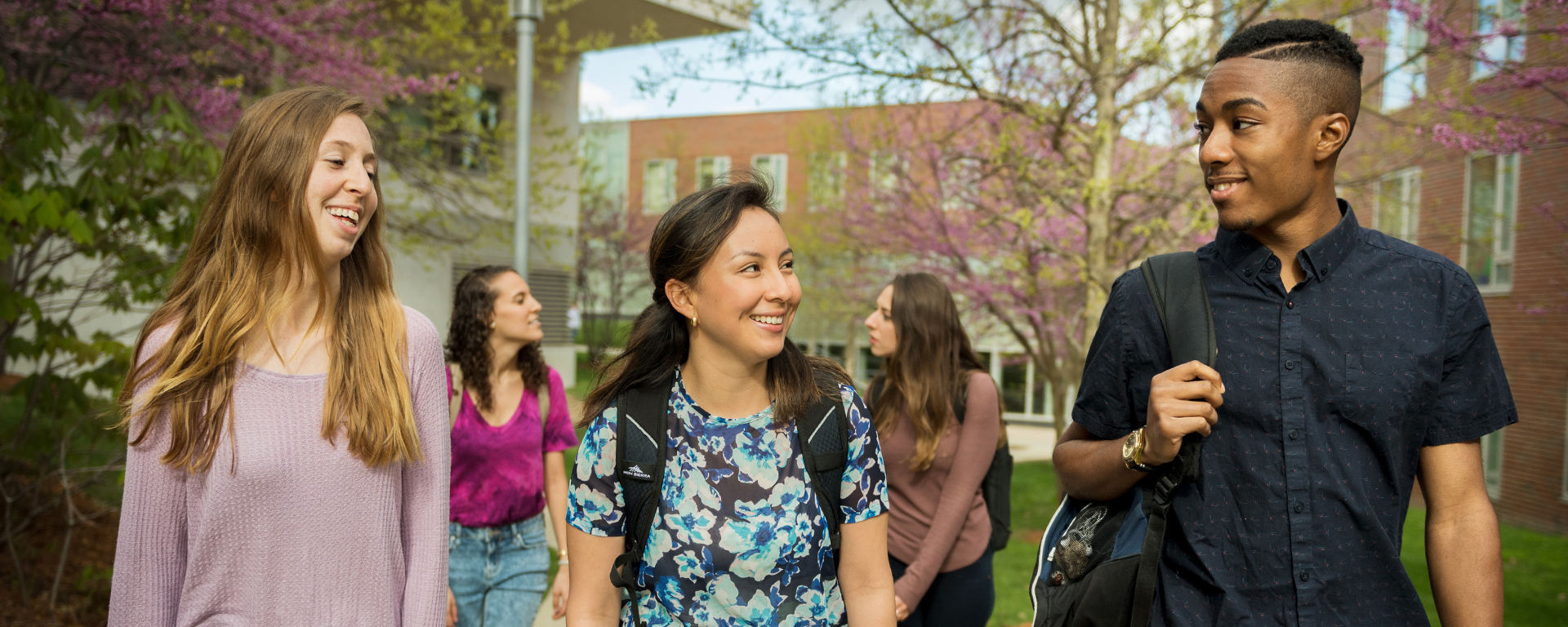 students walking across campus