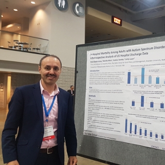 Ilhom presents poster
